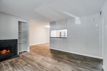 Living Room With Fireplace & Built-In Shelving